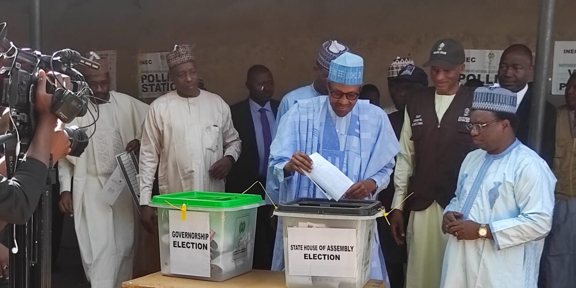 President Muhammadu Buhari votes in Daura, Katsina State, advises the the electorate what to do if politicians tried to offer them money.