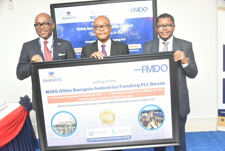 L-R: Chief Executive Officer of FMDQ, Bola Onadele Koko; Group Managing Director, Dangote Industry Limited, Olakunle Alake and Mustapha Ibrahim, the Group Chief Financial Officer, Dangote Industries Ltd. during the Listing Ceremony of the Dangote Industries Funding Plc’s Bonds at FMDQ, in Lagos