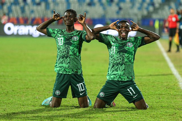 Caption Flying Eagles players celebrate their victory