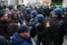 Police arrest 142 protesters amid debate on pension reform