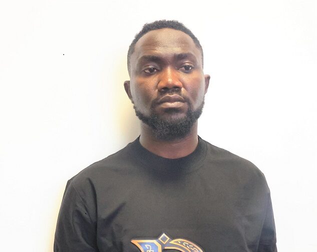 EFCC operatives arrest 32-year-old Enock Ogungbamigbe for serially duping Nigerians with fake Canada visa and job offers in Abuja.