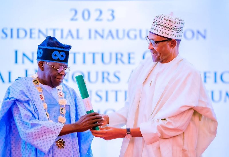 The president-elect handed a scroll by Buhari