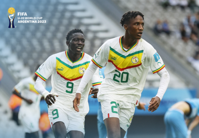 Senegal players celebrate their goal against Israel