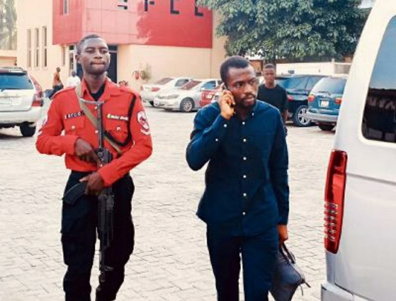 The suspect being led away from the court