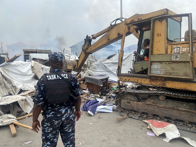 The shanties being demolished