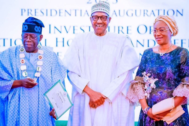 Buhari with the president-elect and his wife, Oluremi