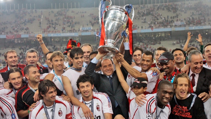 Silvio Berlusconi celebrates a Champions League win with AC Milan