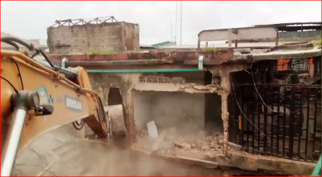 Lagos' bulldozer demolishing plazas at Alaba International Market