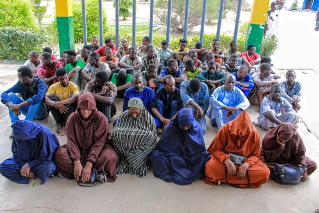 Police arrest 12 foreigners from Mali and Niger Republic distorting their identities to facilitate illegal migration to Saudi Arabia in Kano