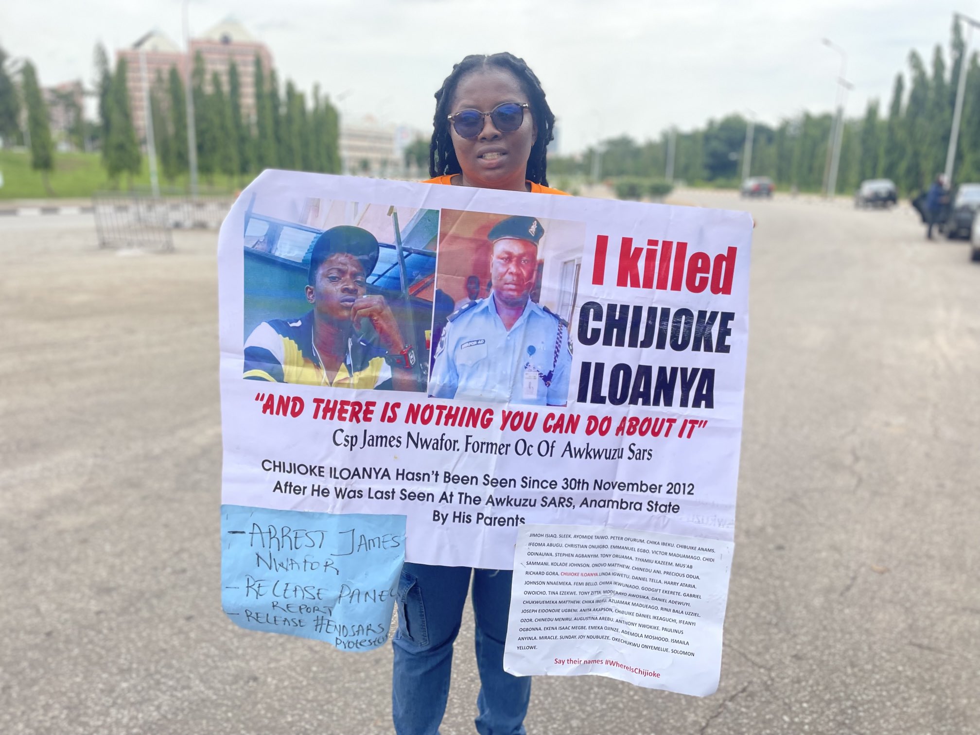 Obiajunu Iloanya begins lone protest for her missing brother, Chijioke Iloanya in the custody of defunct police SARS in Awkuzu, Anambra State.