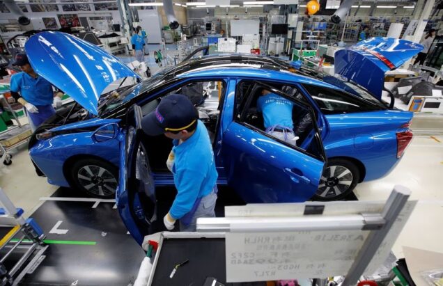 Workers at a Toyota Assembly plant in Japan