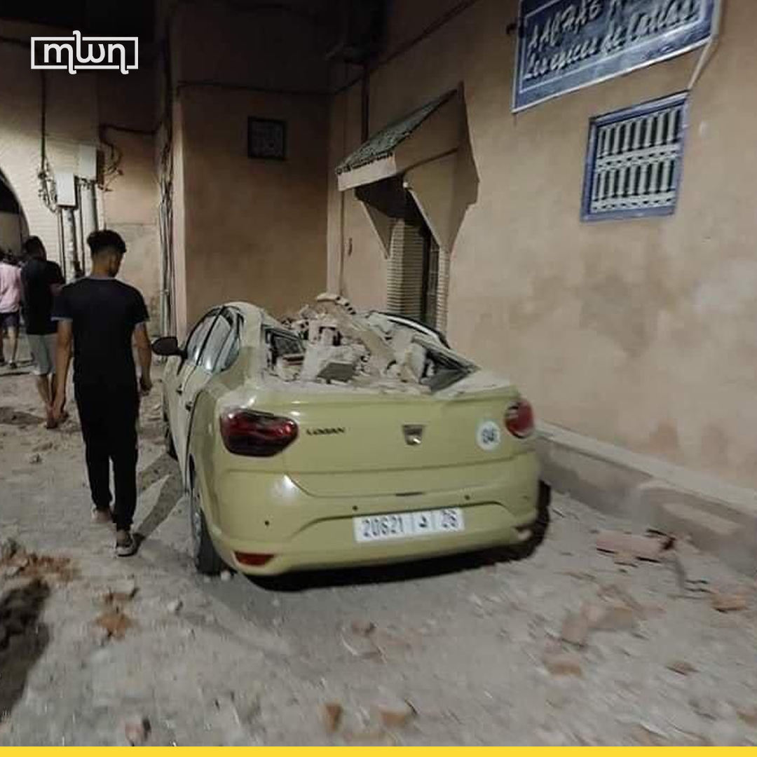 A car destroyed by the earthquake