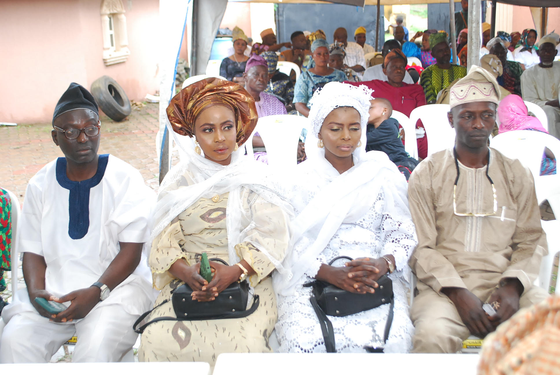 Comrade Awa Bamiji (left) and other family members at the 8th day Fidau prayer for Madam Rafatu Agbeke Oyebamiji