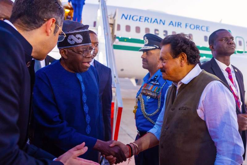 Tinubu lands in India