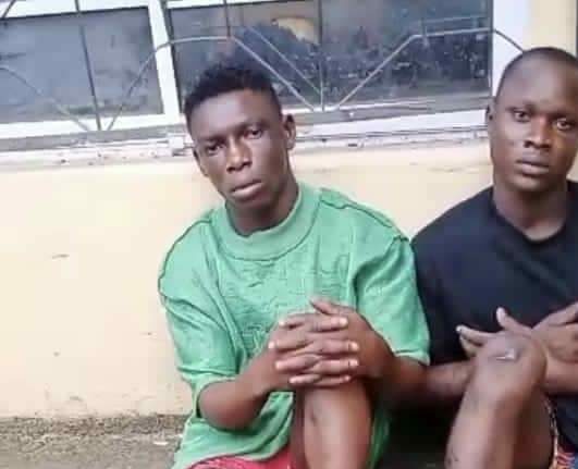 Police arrest two robbery suspects while dispossessing of their valuables on the recently inaugurated 2nd Niger Bridge.