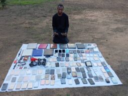 Kano Sales boy Mujjitafa Sale with some of the 890 stolen mobile phones