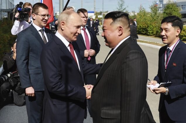 Kim Jong Un, right with Putin on Wednesday