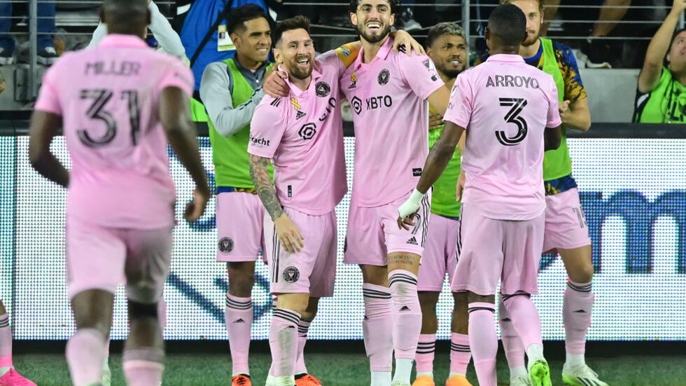 Messi 2nd left with team mates early today