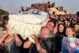 Mourners of the dead victims of Iraqi wedding fire