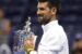 Novak Djokovic with his fourth US Open trophy