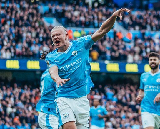 Manchester City move top