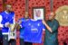 Ogoh Odaudu, head coach of Rivers Hoopers Basketball Club presenting club T-shirt to Governor Fubara in Government House, Port Harcourt on Friday