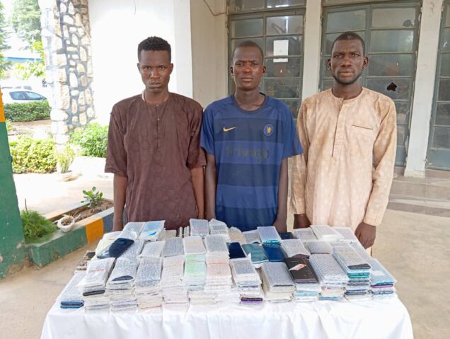The three notorious burglars arrested by the police in Kano for stealing about 671  mobile phones from shops they broke into.