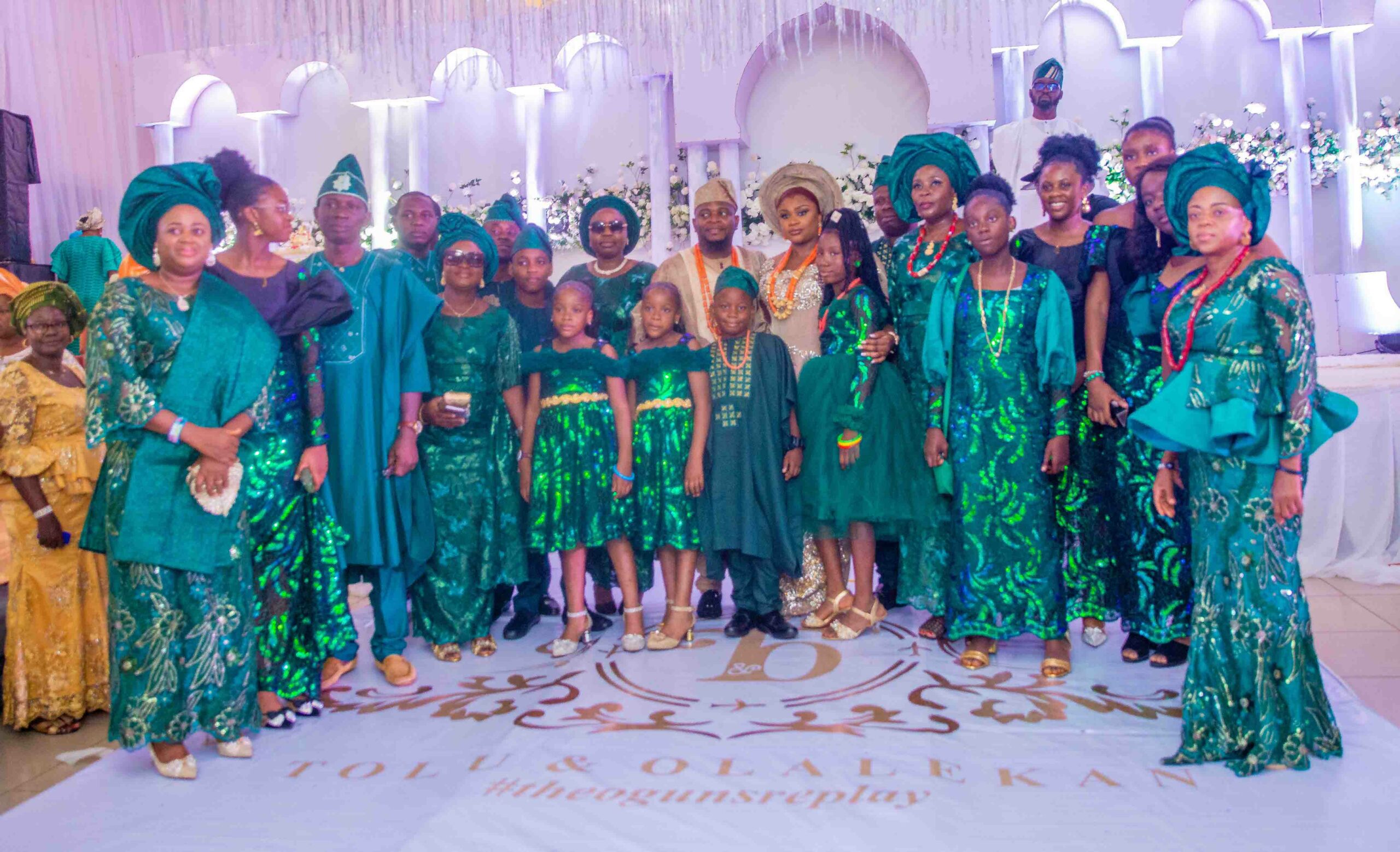 The Couple with the extended Ogun Family at the event (Photo: Ayodele Efunla)