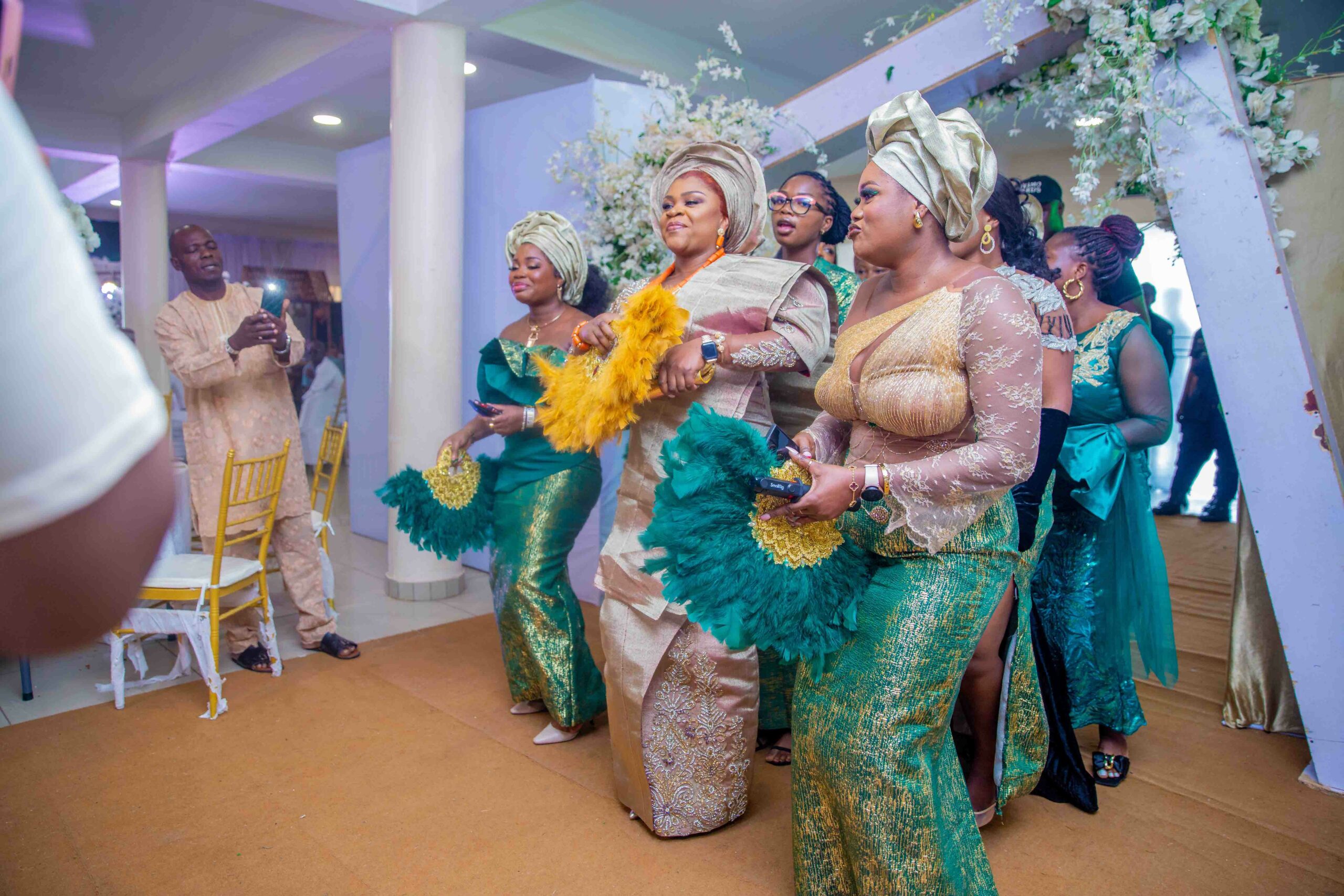 The bride and her friends dancing