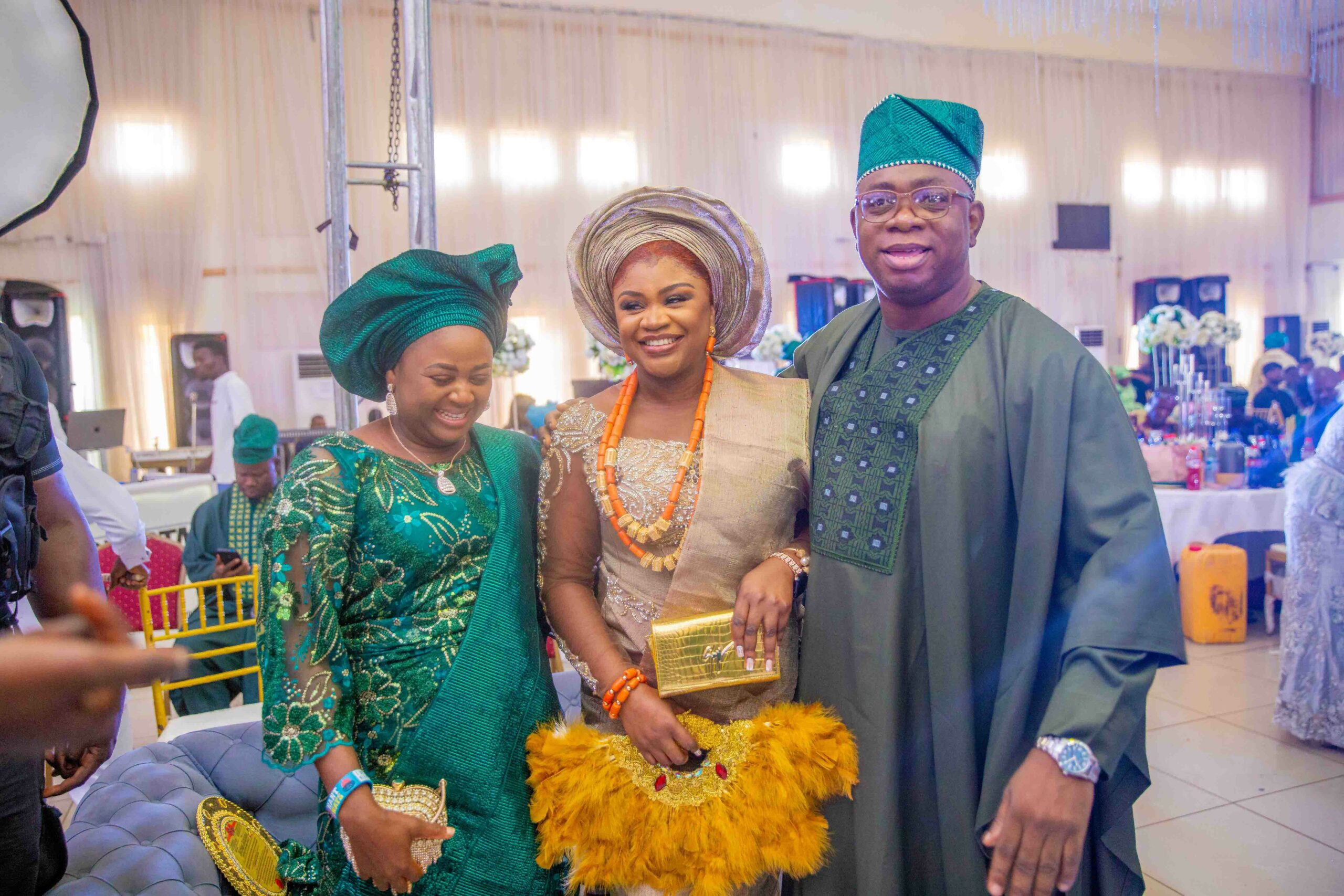 The bride with the parents of the groom (Photo: Ayodele Efunla)