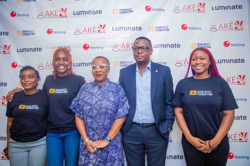 Lola Shoneyin(Middle), Convener, Ake Arts and Book Festival and Mr Maurice Igugu, Chief Marketing Officer, Sterling Bank with team members of the 2023 Ake Arts and Books Festival Photo credit Efunla Ayodele