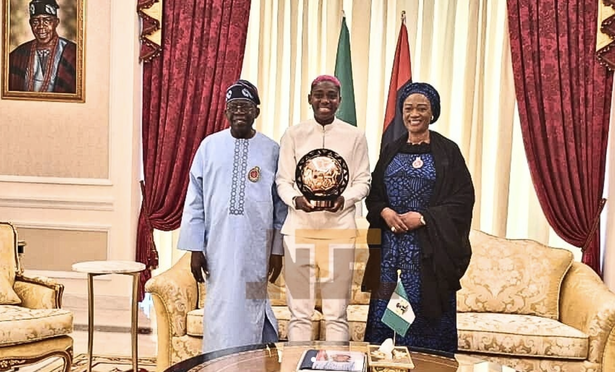 Super Falcon player, Asisat Oshoala presents her African Women Footballer of the Year award to President Bola Tinubu and First Lady, Oluremi