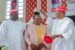 NNPP state Chairman and Governor Yusuf crowning one of the defected APC Council chairmen with the Kwankwasiyya cap at Coronation Hall, Government House, on Saturday
