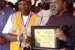 Tompolo (left) being presented with the 'Internal Security Meritorious Award' by the NUJ President Chris Isiguzo on Saturday in Delta
