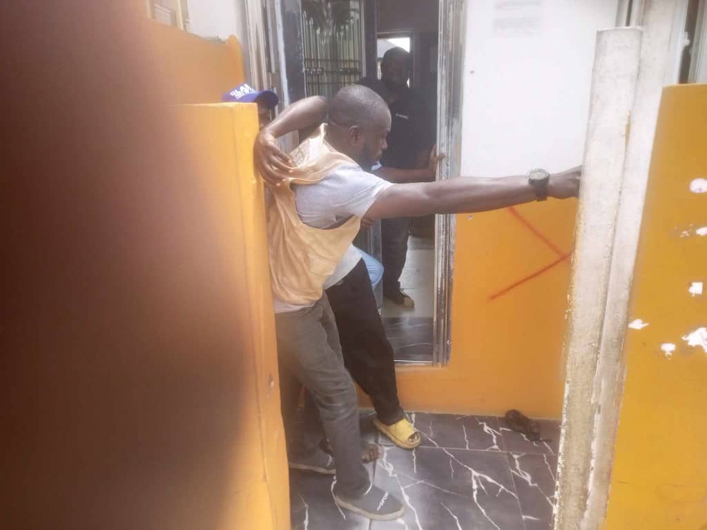 One of the officials of the Lagos State Building Control Agency (LASBCA) allegedly being assaulted by staff of St. Margret School in the school premises
