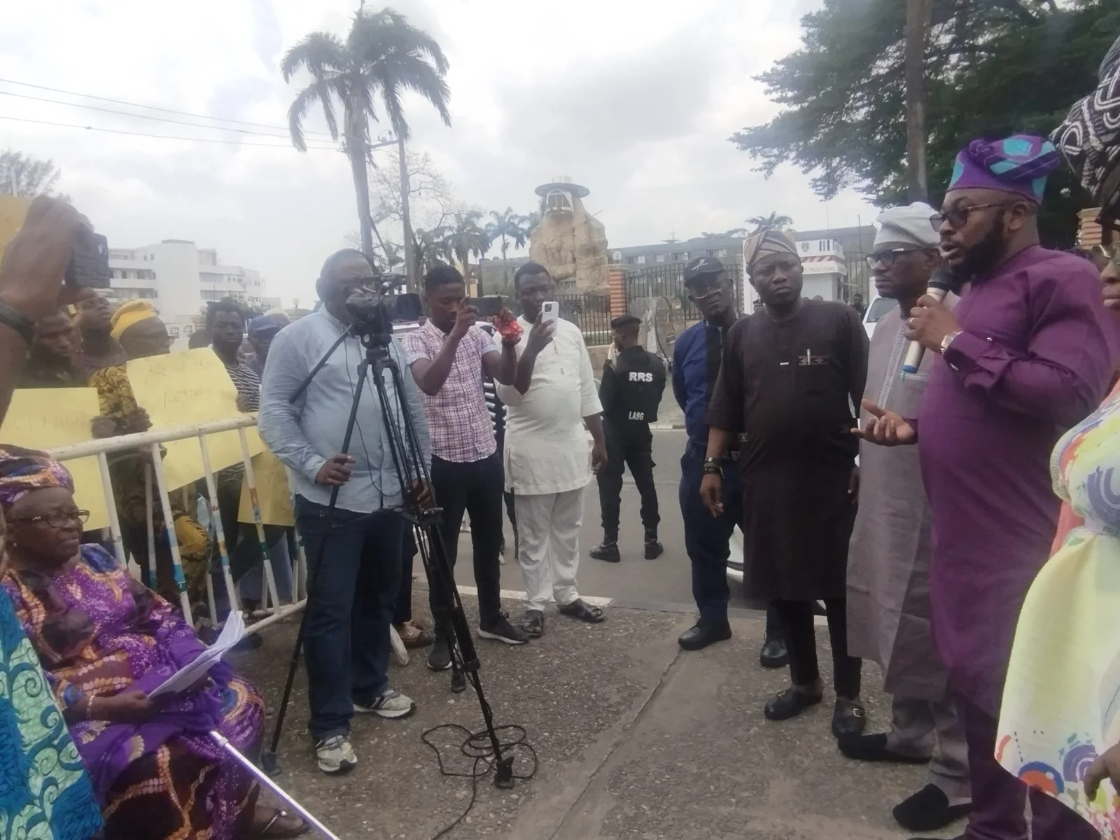80-year-old Muniat Bello leads protest Lagos Assembly over 'foul play' in illegal demolition case between her family and one Nollah Sikiru.