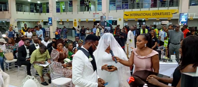 Suprise, excitement as a couple, Olamide Alli and Abiodun Agboola take their wedding vows at the Murtala Muhammed Airport 2, Lagos