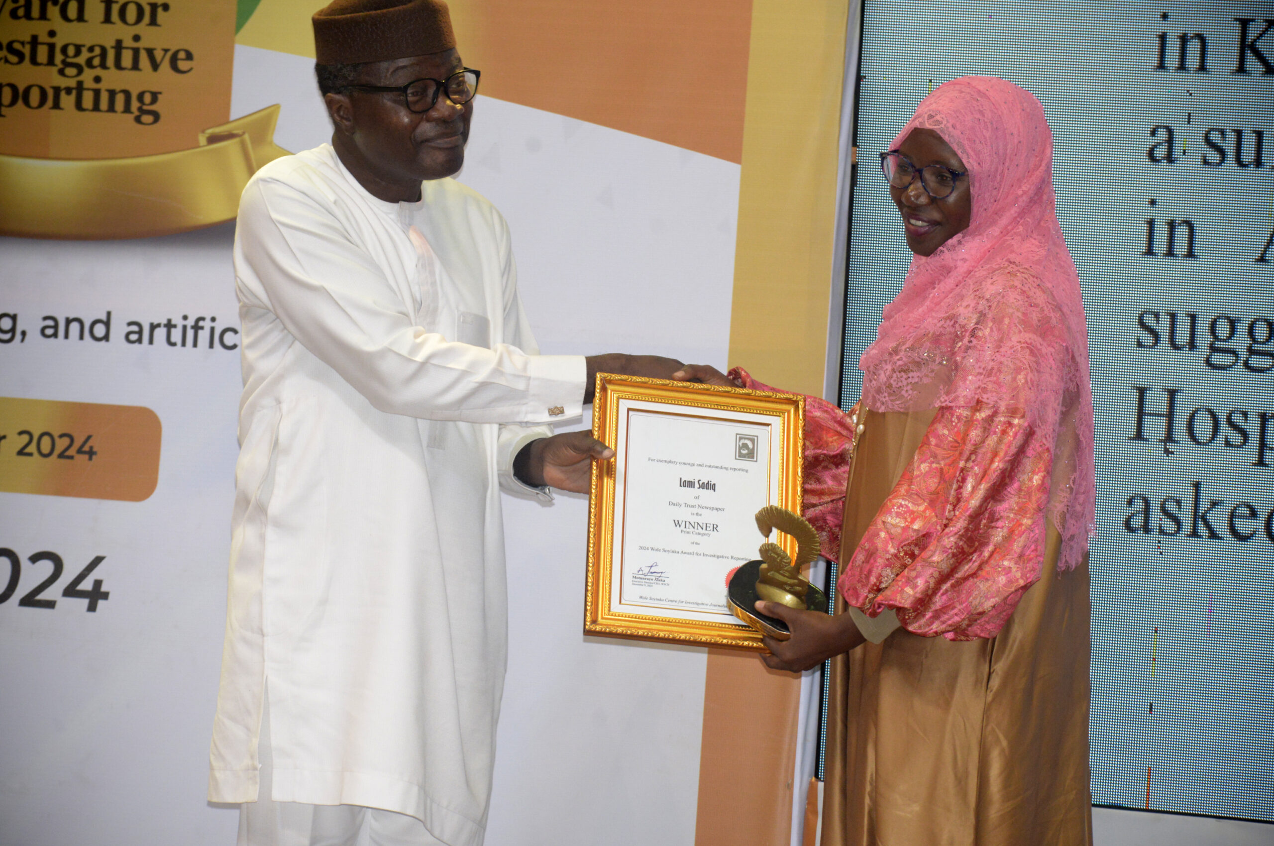 L-R: Kunle Ajibade, Executive Editor of The News; and Lami Sadiq of Daily Trust/winner, Print Category, during the 19th Wole Soyinka Award for Investigative Reporting held at the AGIP Recital Hall of the MUSON Centre in Lagos, on Monday, December 9, 2024.