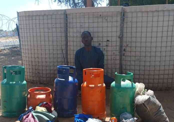 MNJTF troops nab Murktar Alhaji Chari with suspected IED making materials allegedly being convened to terrorists in Gubio LG of Borno State.