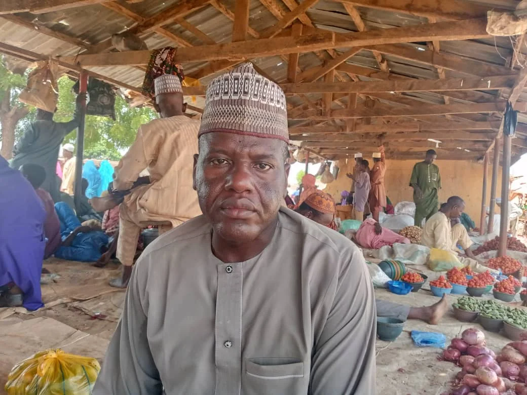 Umaru Musa Yar’adua University (UMYU), Katsina professor, Nasir Hassan-Wagini produces and sells vegetables at a weekly market in Batsari,