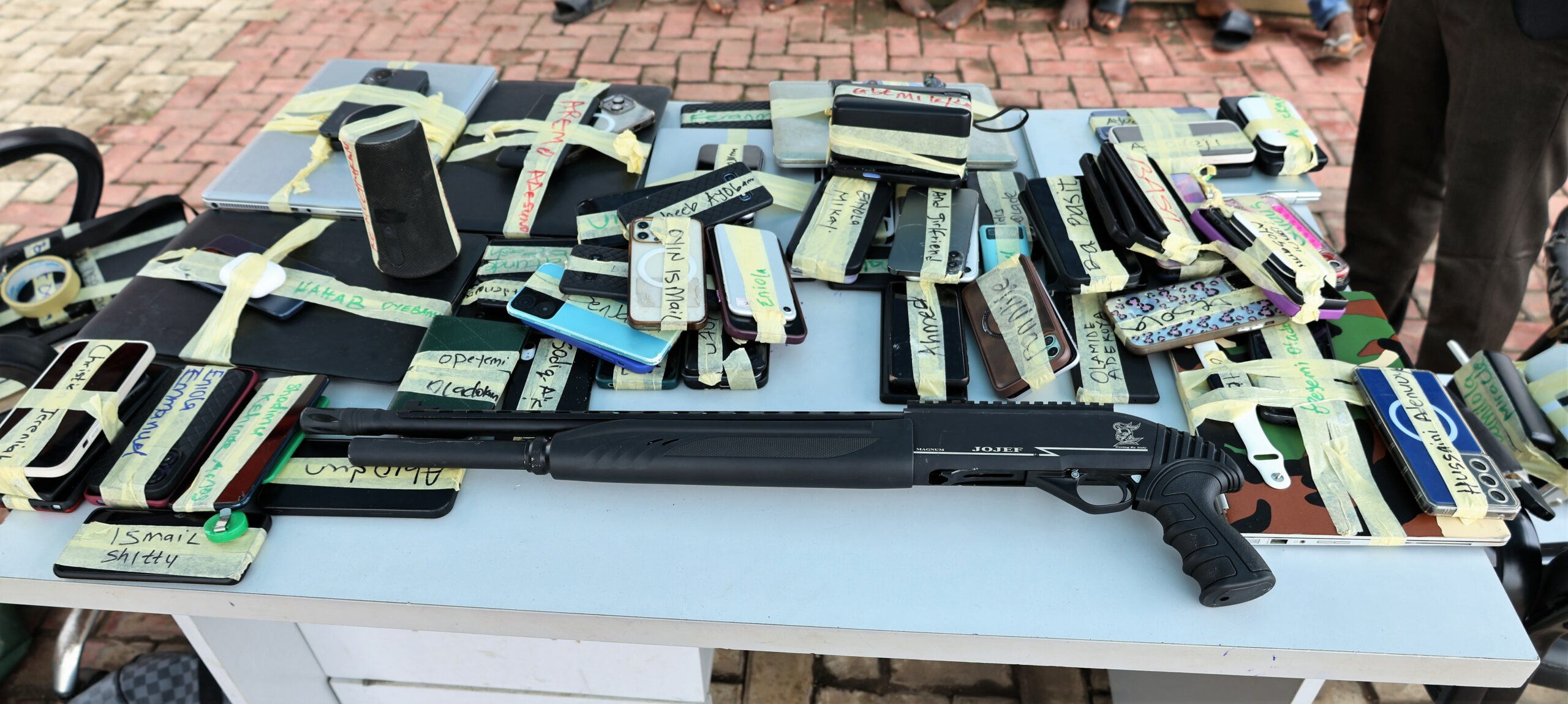 EFCC lists pump action rifle among items recovered from 48 suspected internet fraudsters arrested by its operatives in Abeokuta, Ogun State.
