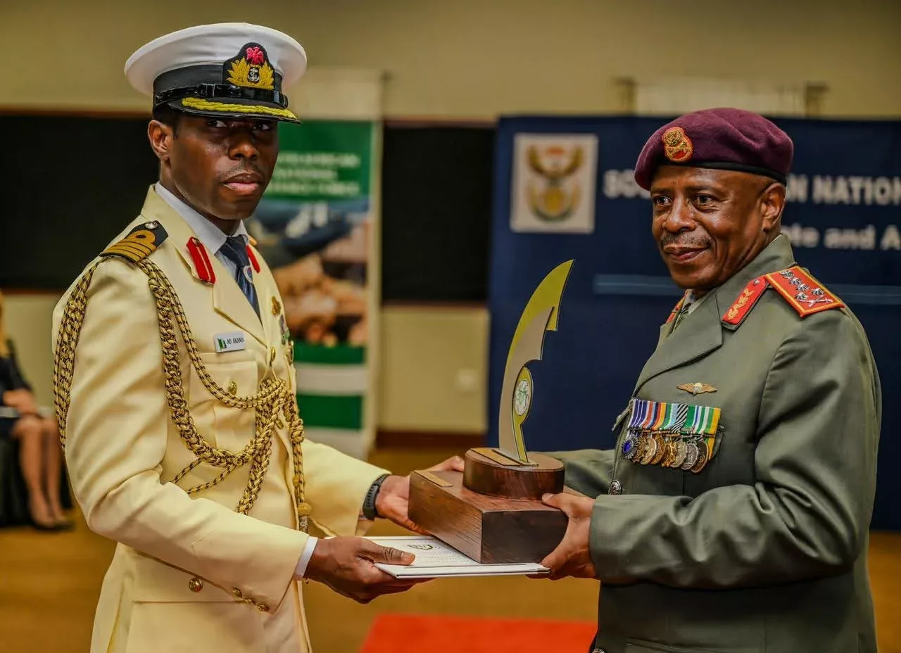 Nigerian Navy officer, Navy Capt. Abidemi Akano wins overall best student award at the South African National Defence College.