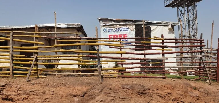 this makeshift school offers free education with sets of uniforms, sports and play wears topping it with a meal daily to keep the indigent children in school.