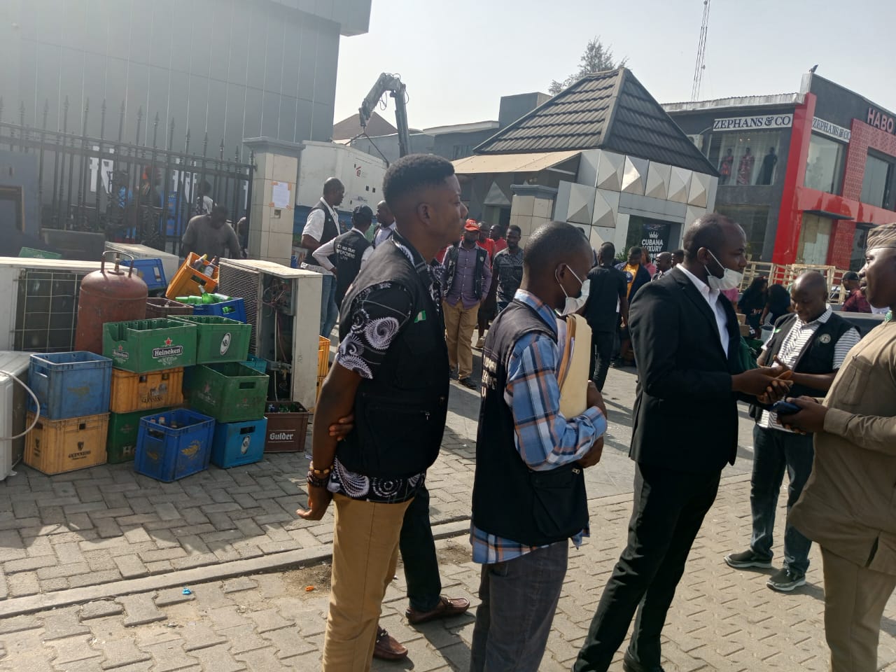 Court sheriffs hands over property housing Cubana Lounge, Wuse II, Abuja to the owner, Collins Onwuzulike after executing eviction order 