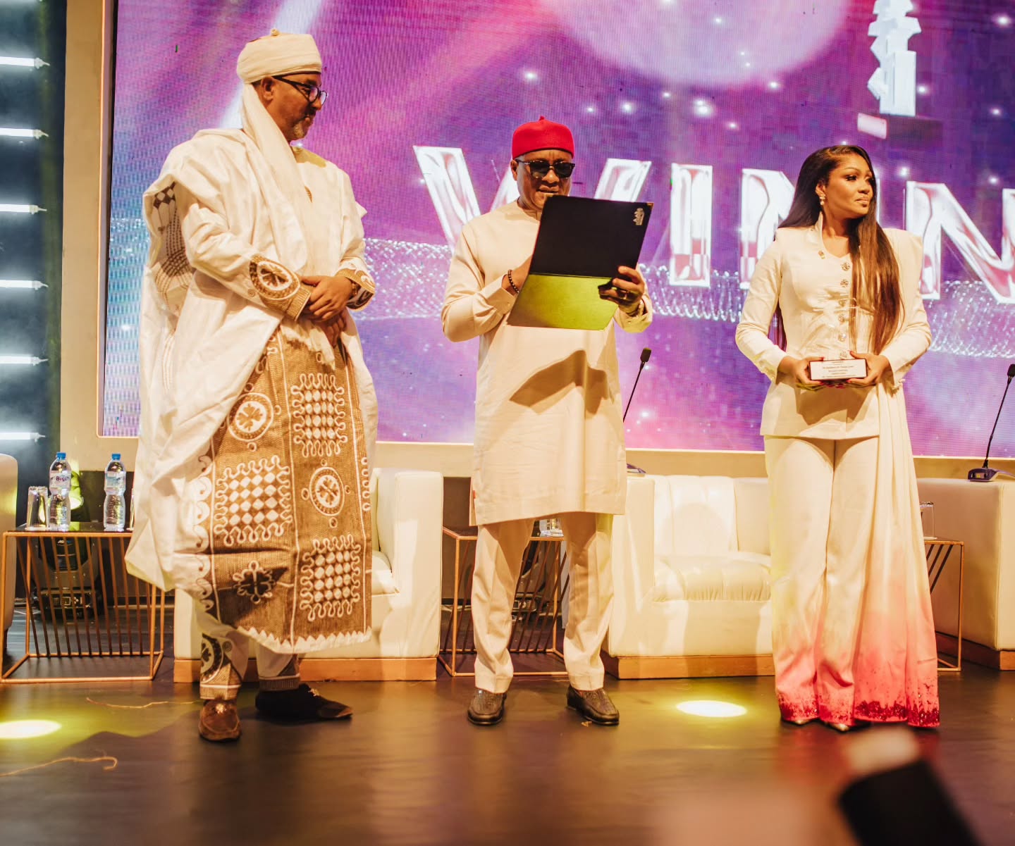 Representing His Excellency, Dr. Dauda Lawal, Executive Governor of Zamfara State, the Chief of Staff receives the GAH Human Capital Development Award 2025, presented by Dr. Allen Onyema, CEO, Air Peace, alongside Dr. Princess Ogene, Convener, GAH Awards & Business Summit.