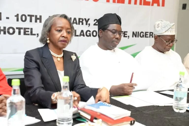 From left; INEC National Commissioner, May Agbamuche-Mbu; INEC National Chairman, Joash Amupitan; and INEC Resident Electoral Commissioner in Lagos State, Prof. Ayobami Salami, at the induction/retreat for the newly appointed INEC Chairman, National Commissioners and RECs in Lagos on Friday.