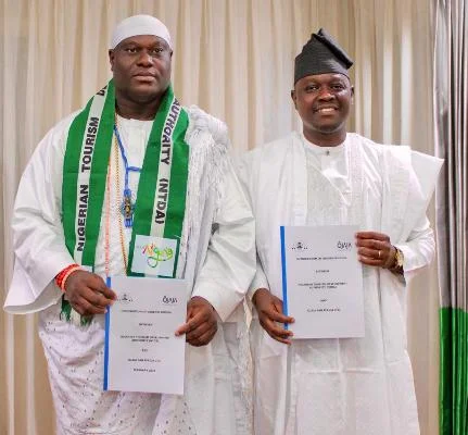 DG, NTDA, Dr. Ola Awakan and the Ooni of Ife, Chairman OJAJA Pan African Ltd, His Imperial Majesty, Adeyeye Enitan Ogunwusi, Ojaja II at the signing of an MoU in Abuja in a historic move for Nigerian tourism development.