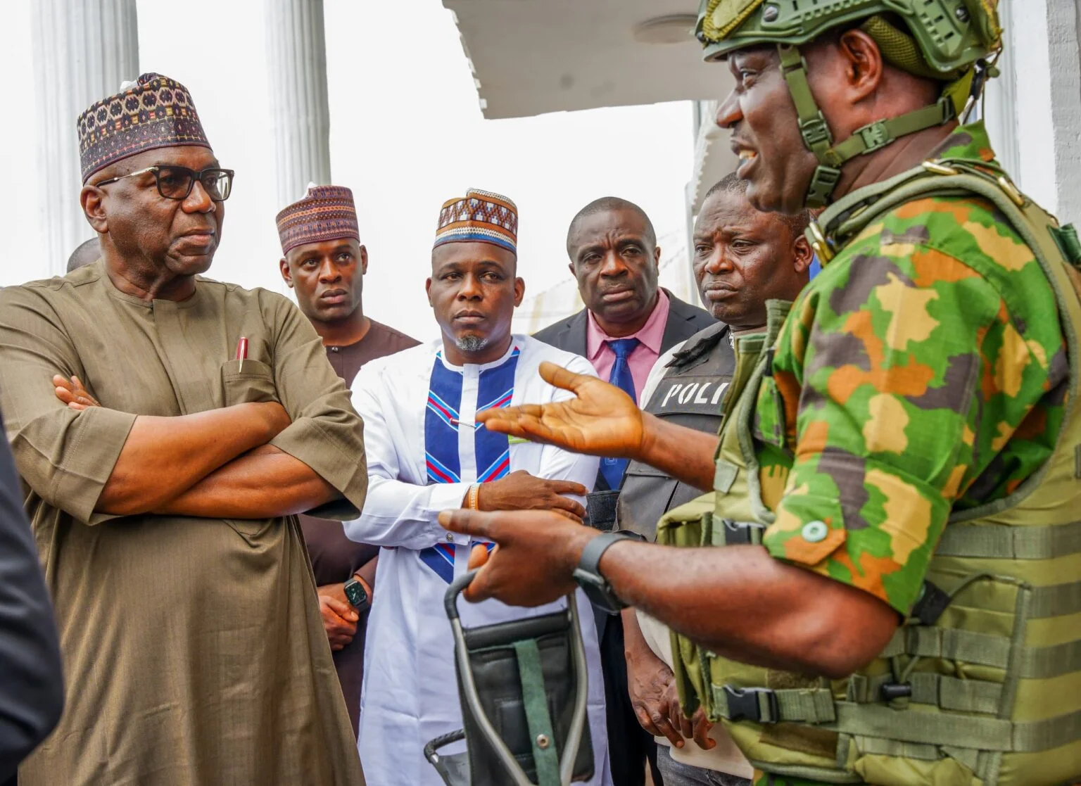 L-R Gov. AbdulRahman AbdulRasaq of Kwara and the Chairman of Ifelodun Local Government Council, Femi Yusuf being briefed by a senior security officer during one of the attacks