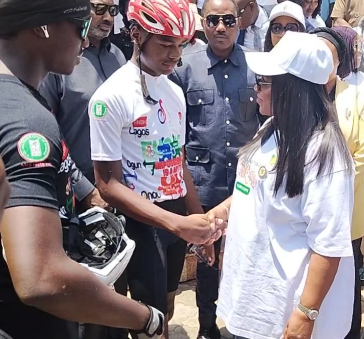 Delta First Lady, Tobore Oborevwori, others receive 16-year-old autistic cyclist, Kanyeyachukwu Tagbo-Okeke, in Asaba, the state capital