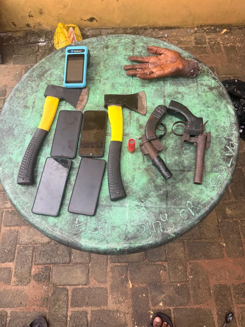 Police nab 21-year-old Samson Onilewaji with suspected human hand, pistols, one live cartridge, two axes, POS and five ATM cards in Lagos